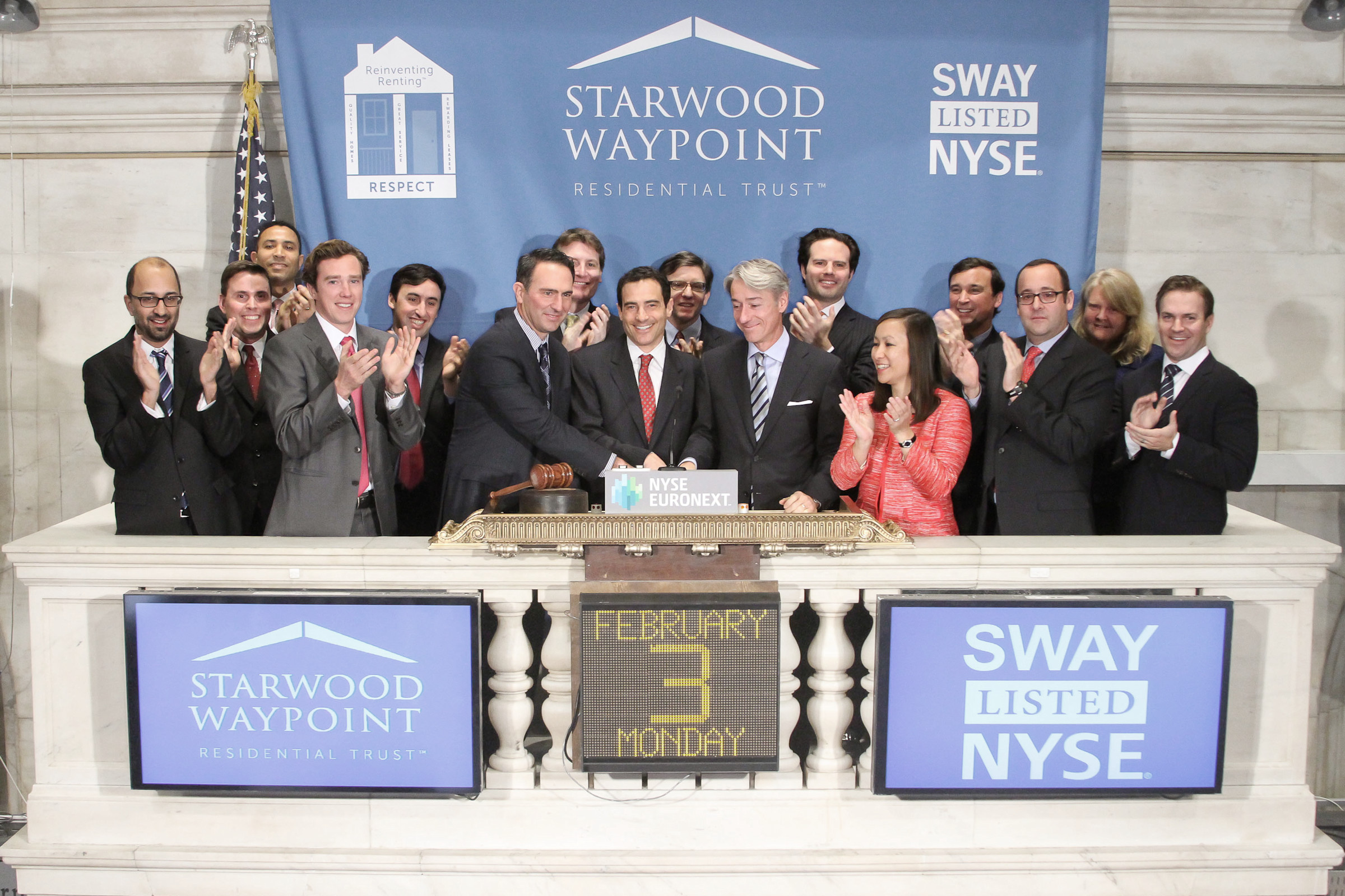 Doug Brien and Gary Beasley with the Waypoint team at the New York Stock Exchange