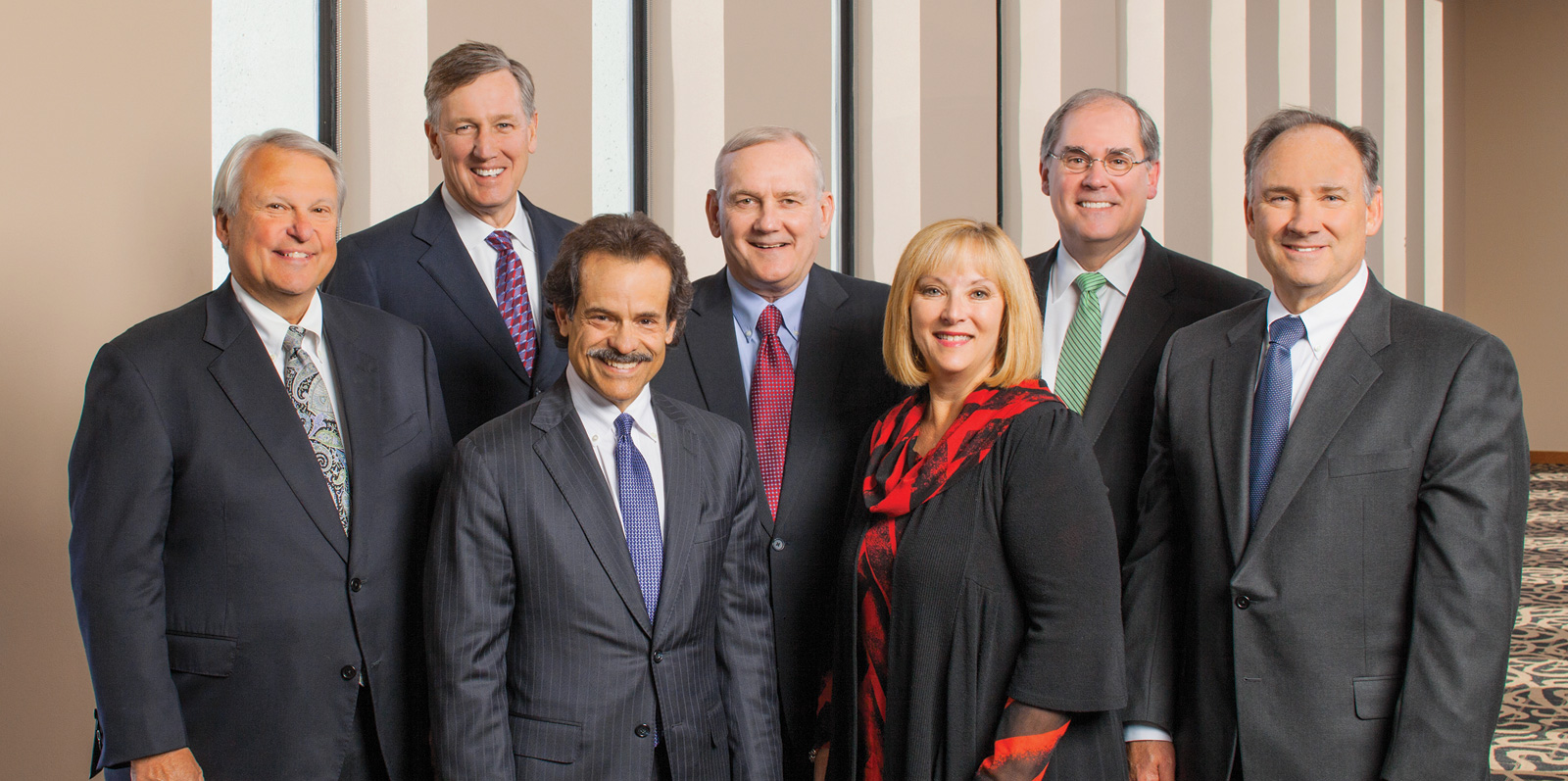 The seven members of the ONE Gas board in 2014, with Douglas H. Yaeger standing at the far left.