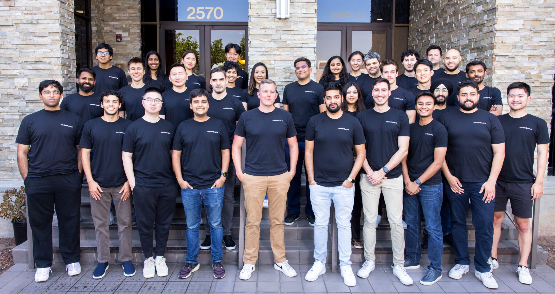 Contextual AI team gathered outside its office in the photograph published with its 2024 Series A announcement
