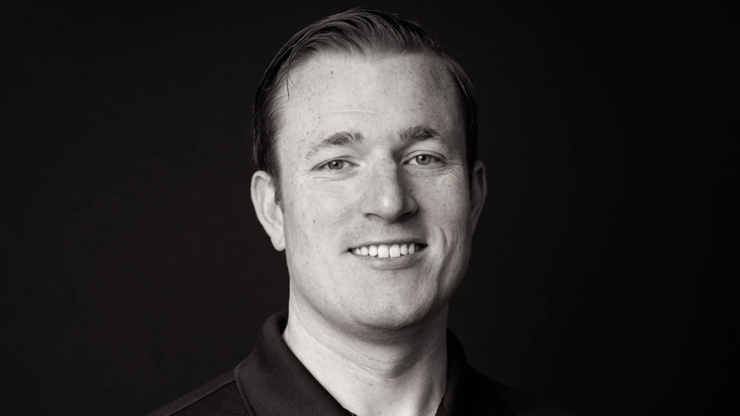 Dragos co-founder and CEO Robert M. Lee in a black-and-white portrait
