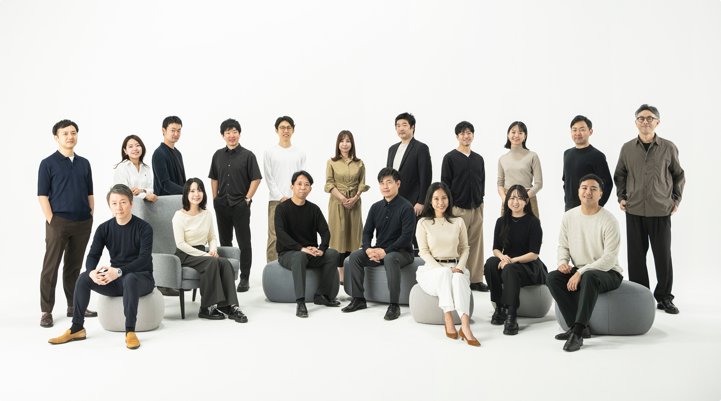 DNX Capital’s Japan team posing together in a bright studio