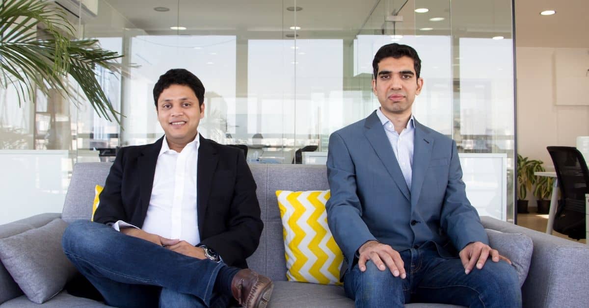 Drip Capital co-founders seated together in an office