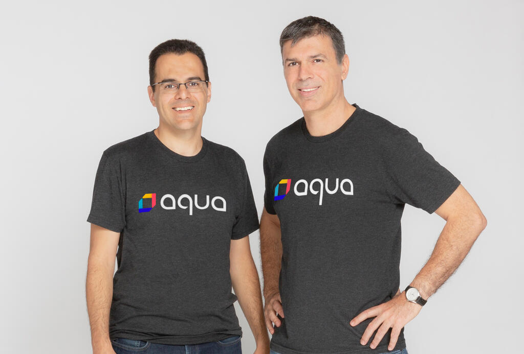 Aqua Security co-founders Dror Davidoff and Amir Jerbi wearing Aqua T-shirts