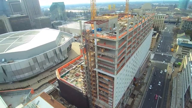 Aerial production frame of construction beside Sacramento's arena