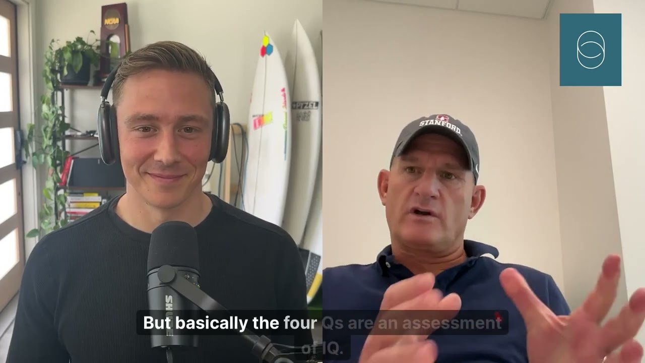 Dave Nolan interviewing Duke Rohlen, who wears a Stanford cap and gestures during their conversation