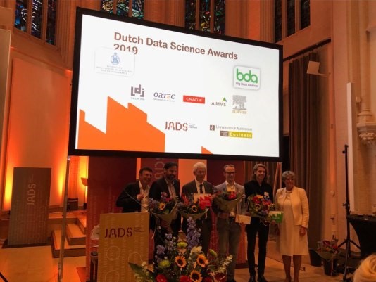 Recipients and organizers on stage at the 2019 Dutch Data Science Awards