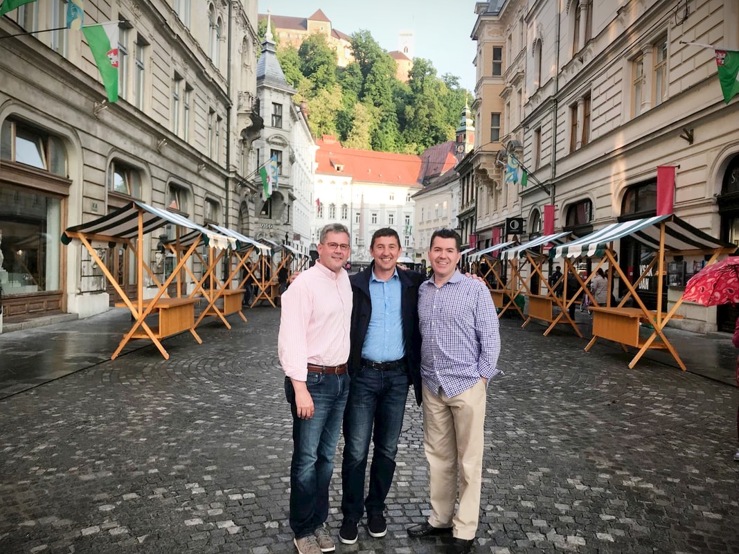 Dusan Omercevic, centre, pictured outdoors with two other people