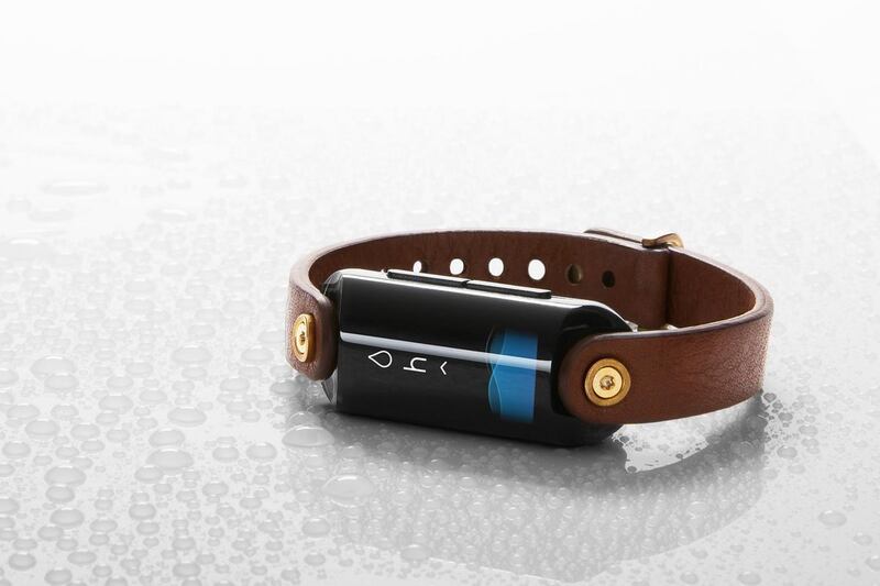 The proposed LVL wearable, a black electronic module held in a brown leather band