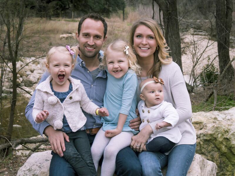 Dustin Freckleton outdoors with his wife Crystal and their three daughters in a family photograph published in 2017