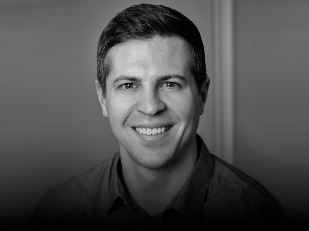Black-and-white press portrait of Dustin Sedgwick