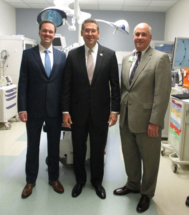 Dr. Nathan McIntosh, Rep. Gregg Harper and Dwayne Blaylock standing together at River Oaks in Flowood