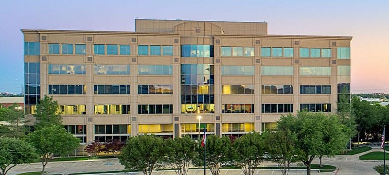 Exterior of the Plano headquarters building pictured on the company website