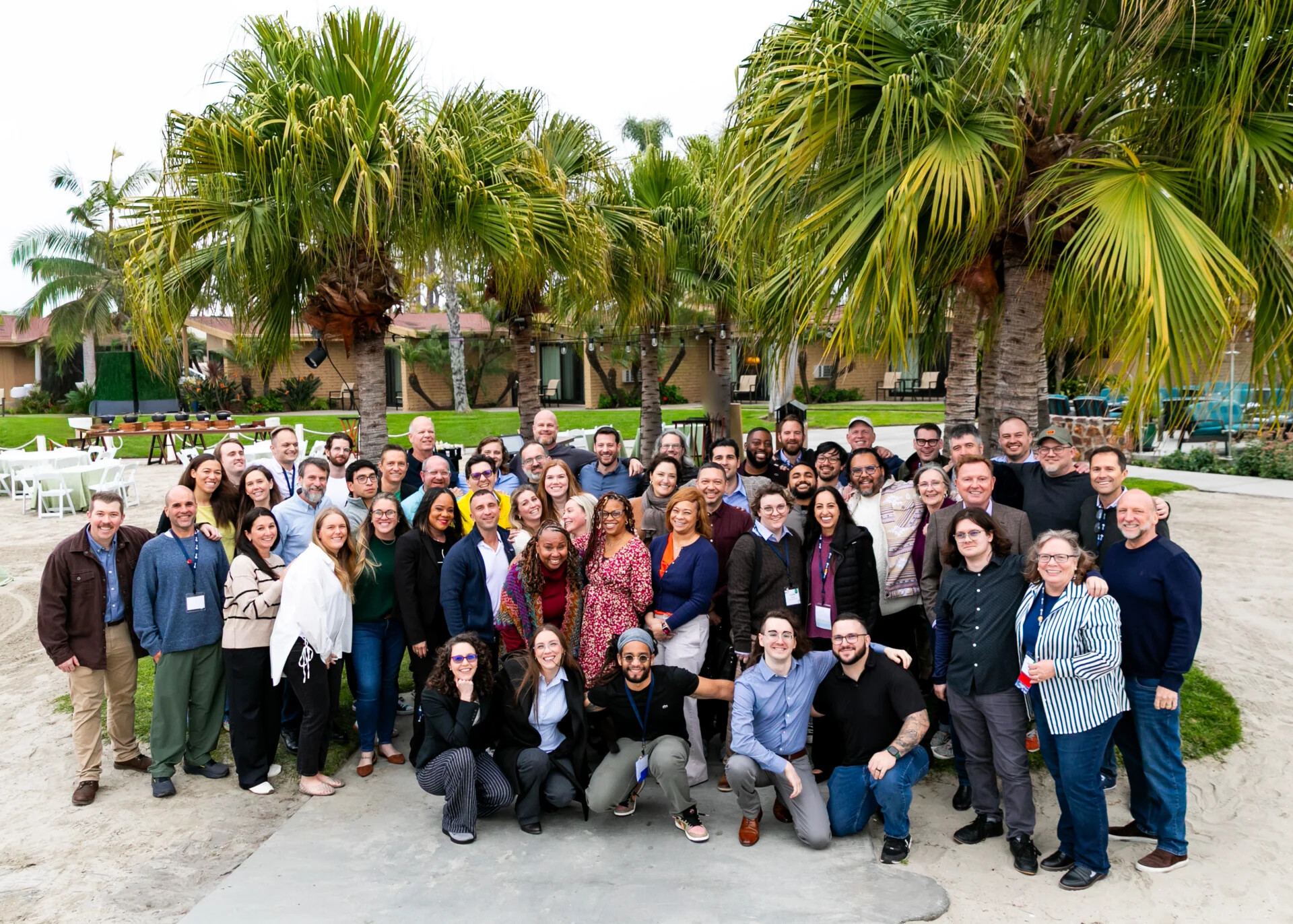 Members of the e123 team gathered at a company meeting
