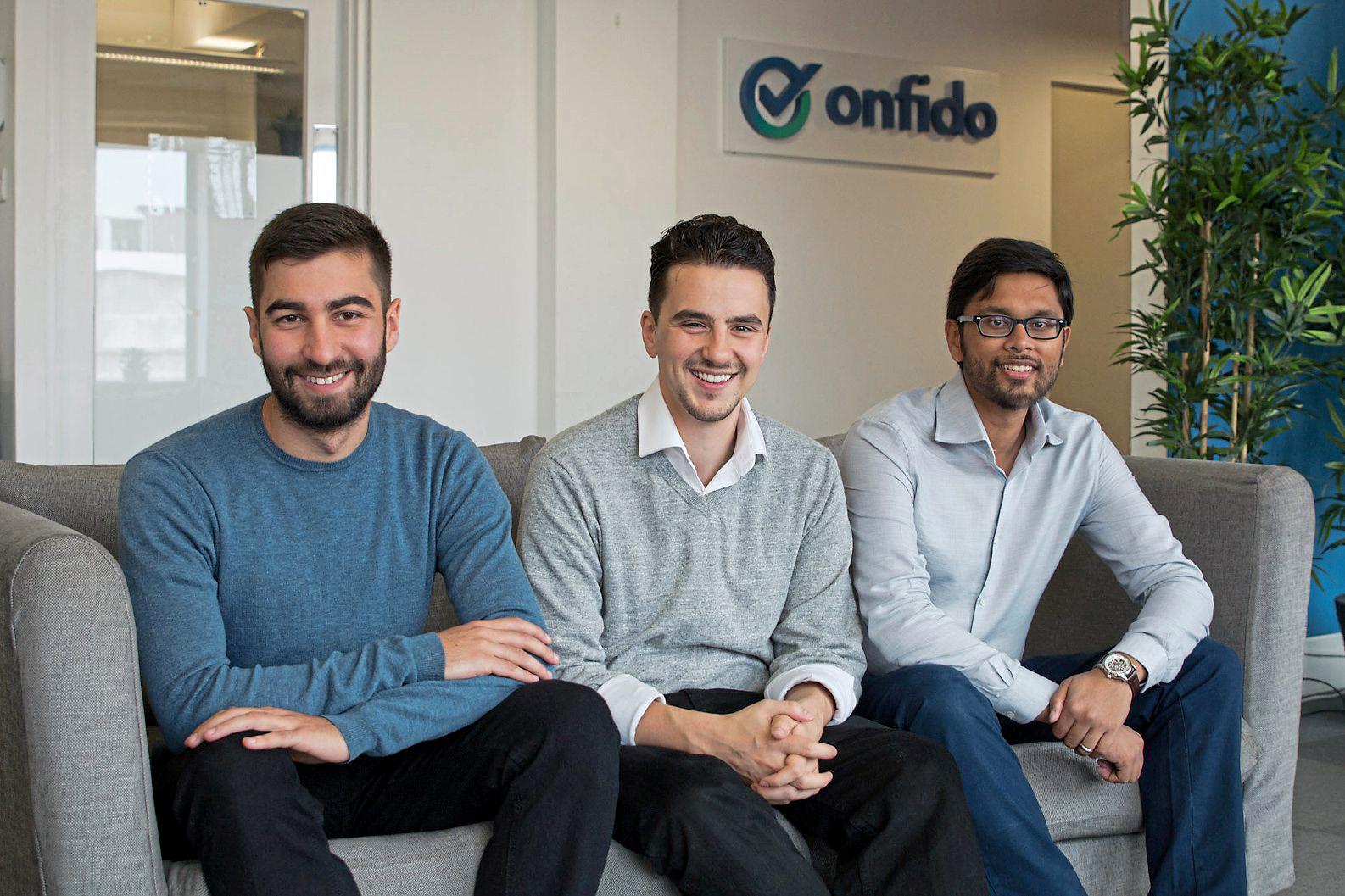 Onfido co-founders Eamon Jubbawy, Husayn Kassai and Ruhul Amin sitting together in their office
