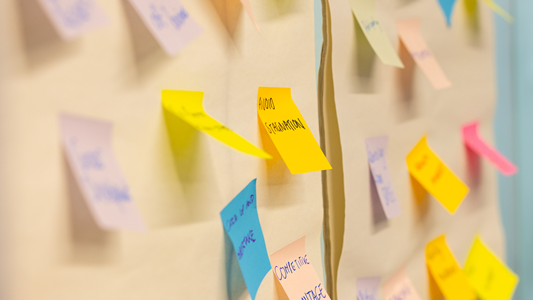 Colourful sticky notes on a wall during ECA’s 2025 collaboration day