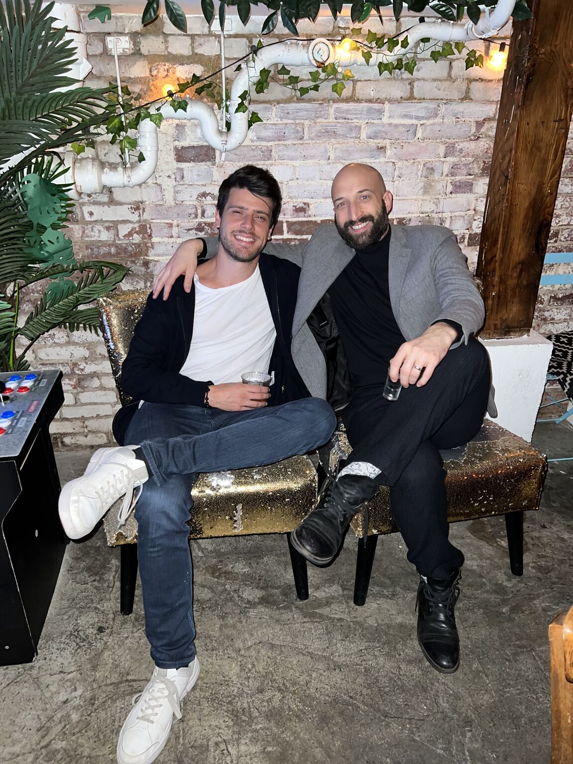 Ed Gaussen and Matt Kennedy seated together at their December 2021 Series A celebration