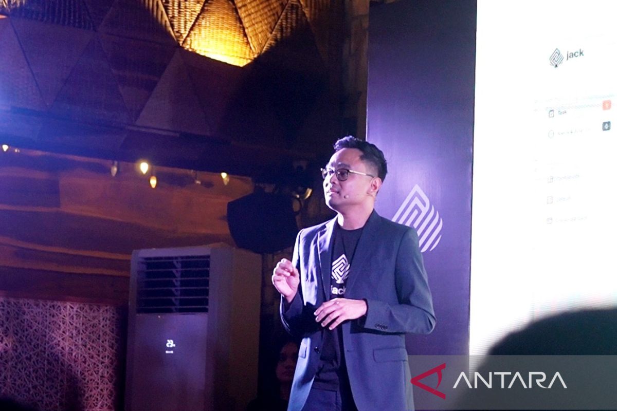 Edo Windratno speaking onstage during the launch of Jack