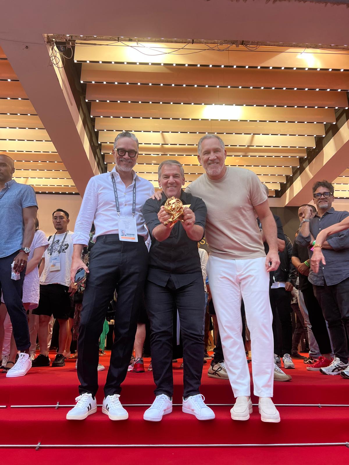 Eduardo Maruri, right, celebrates with colleagues and a Gold Lion at Cannes in 2024