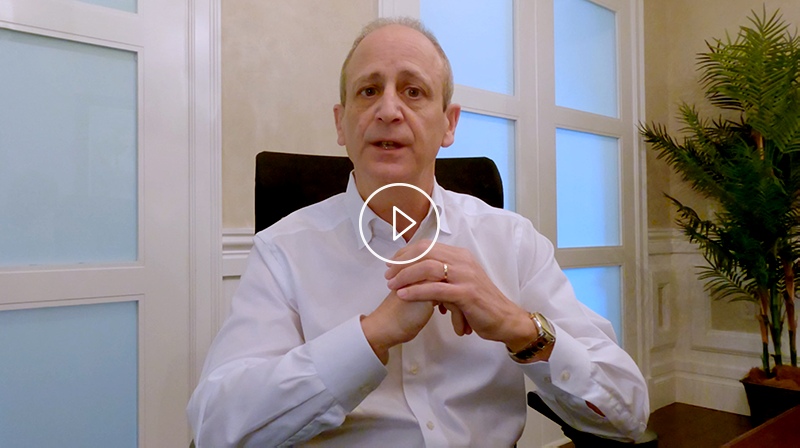 Edward Fiorentino seated with hands clasped during a GTCR interview