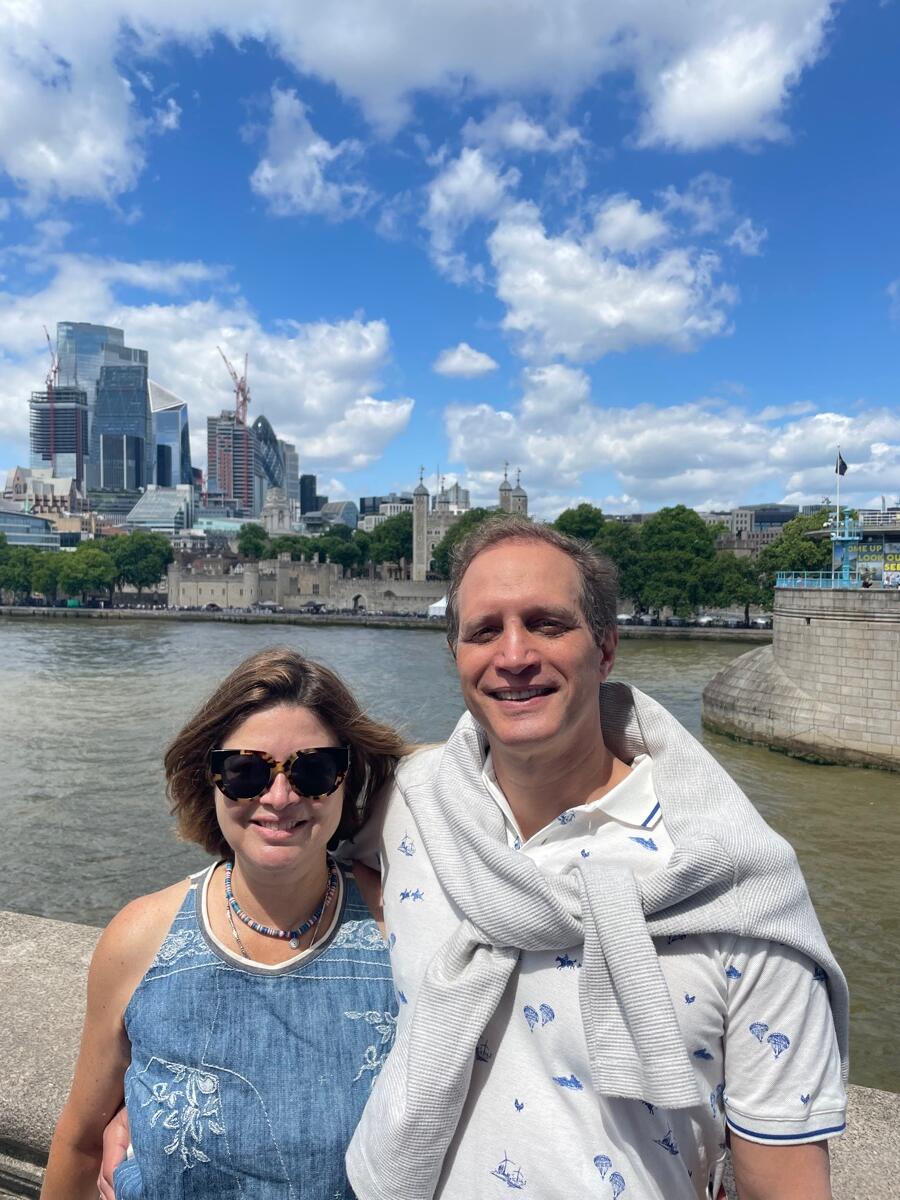 Einat Steklov, left, with a companion beside the River Thames, with the Tower of London across the water