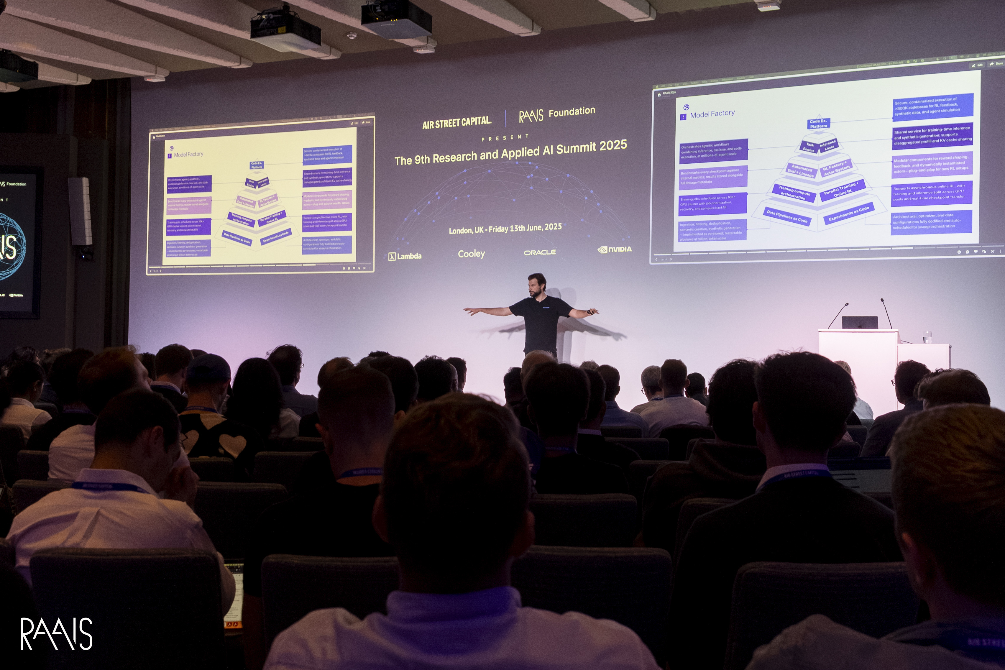 Eiso Kant presents Poolside's Model Factory on stage at RAAIS 2025 in London