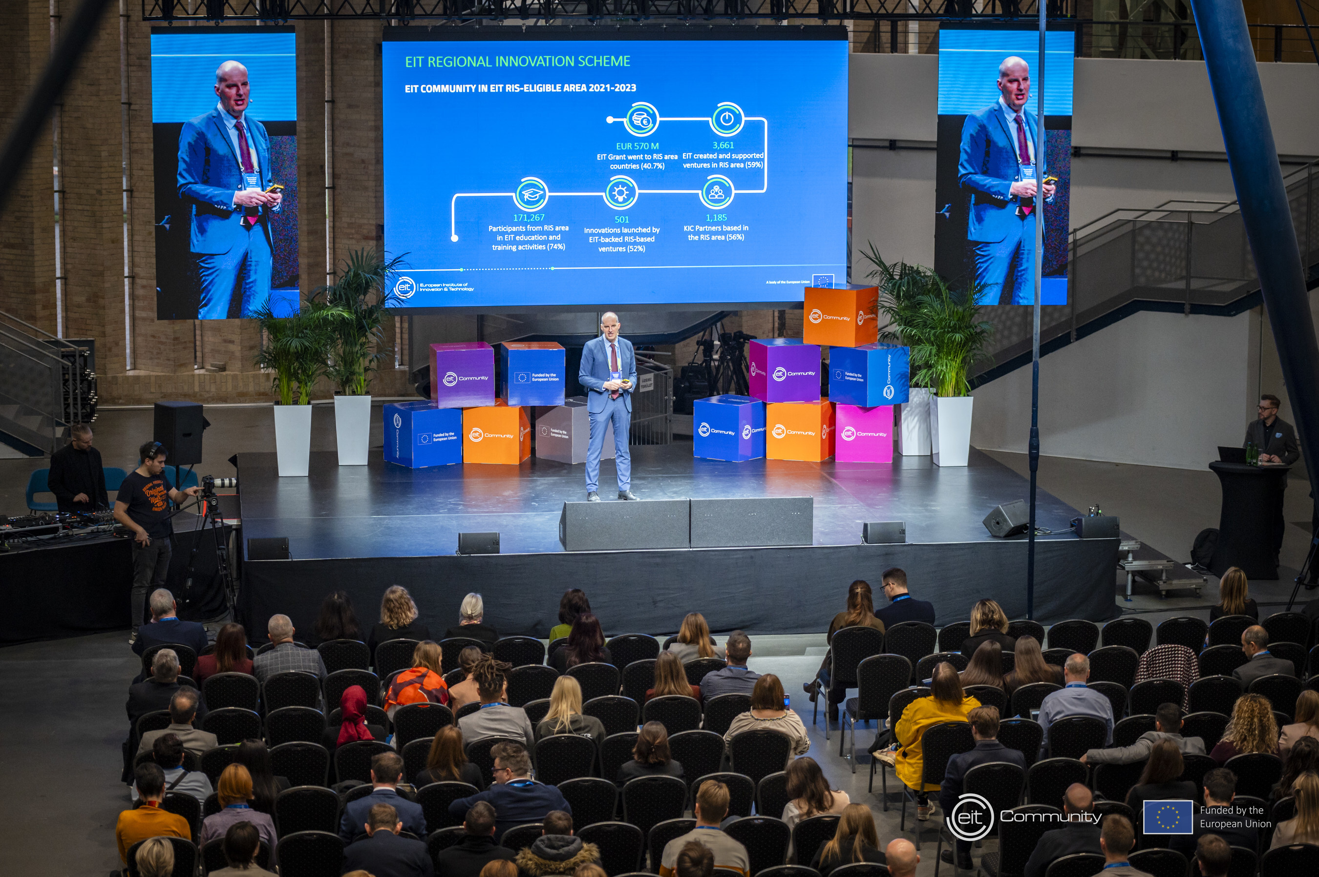 Martin Kern speaking on stage at the 2024 EIT Jumpstarter Grand Final in Budapest