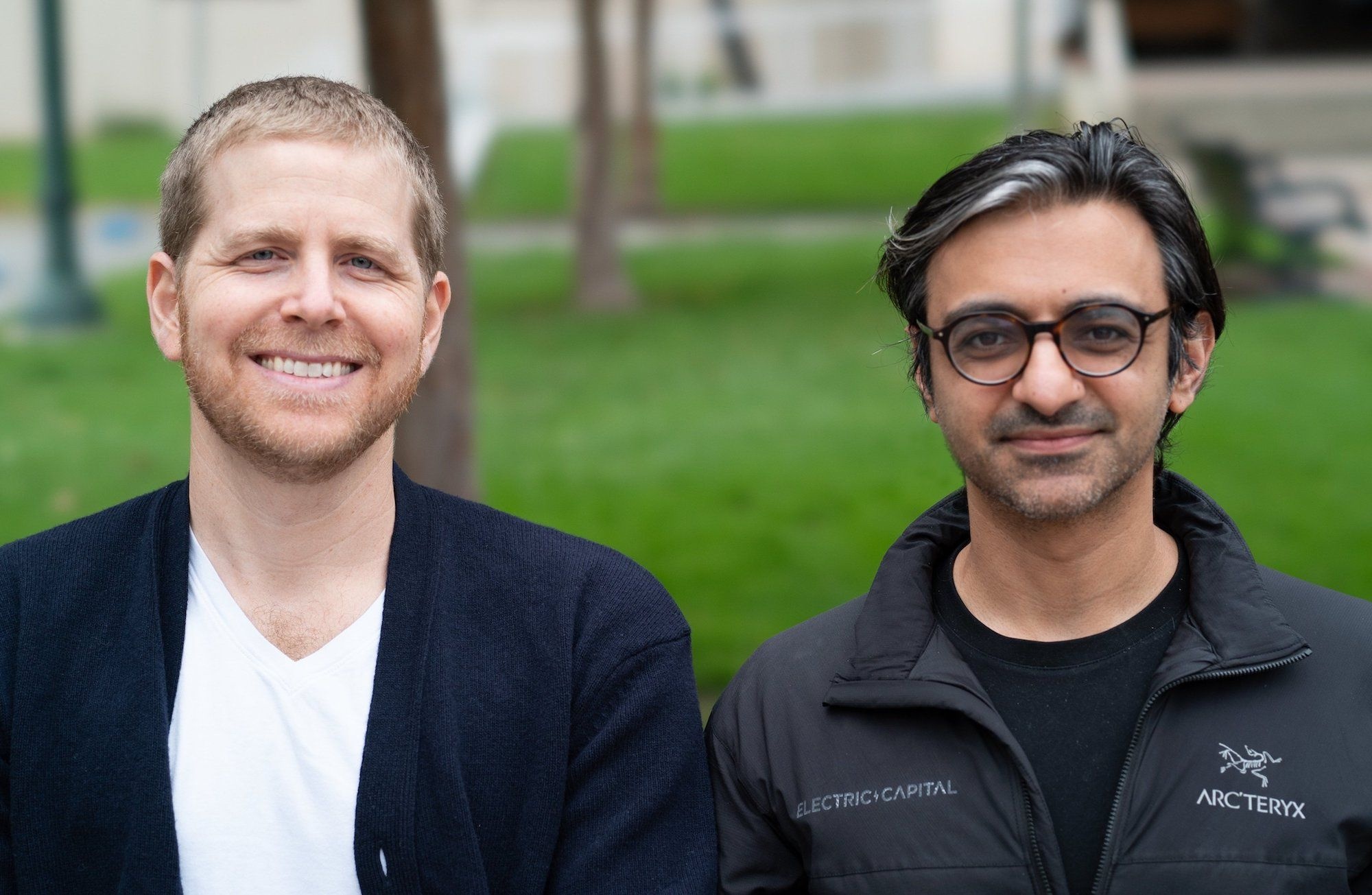 Electric Capital co-founders Curtis Spencer, left, and Avichal Garg outdoors