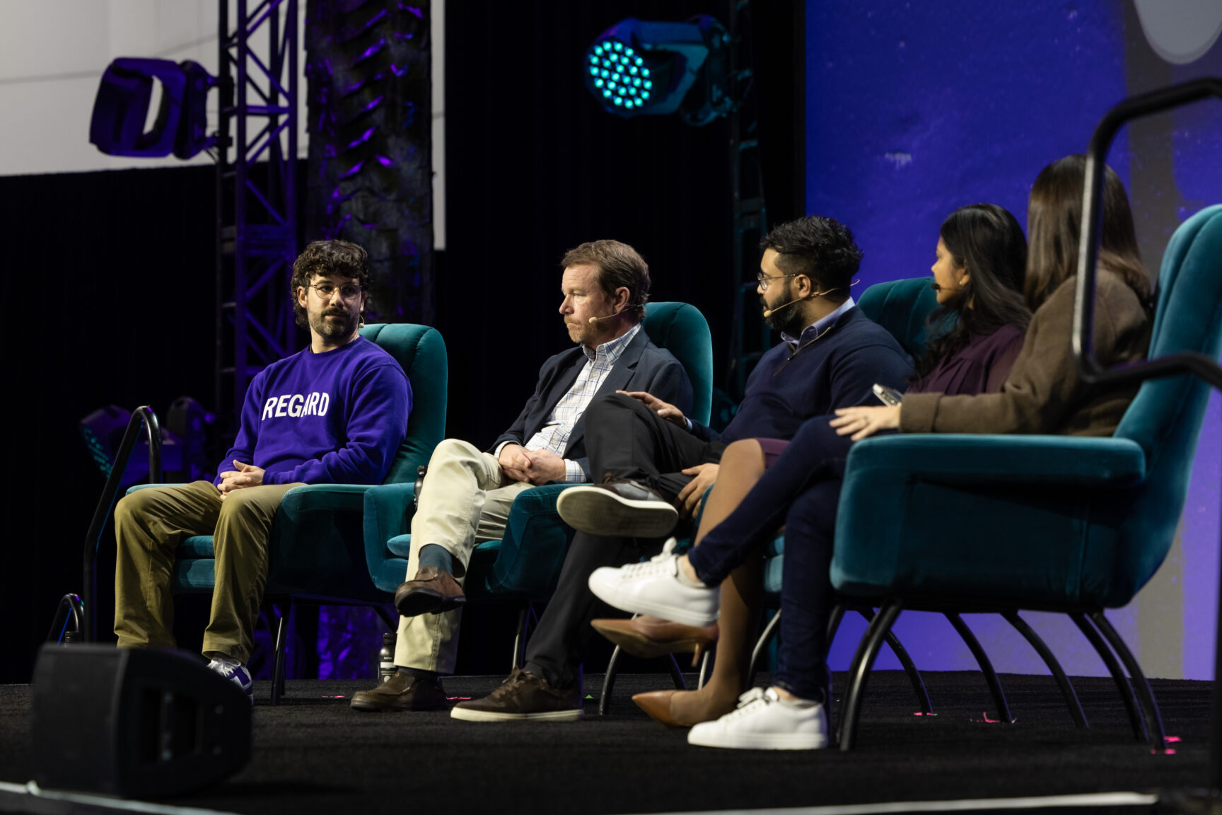 Eli Ben-Joseph, at left in a purple Regard sweatshirt, seated with fellow speakers on the ViVE 2026 stage