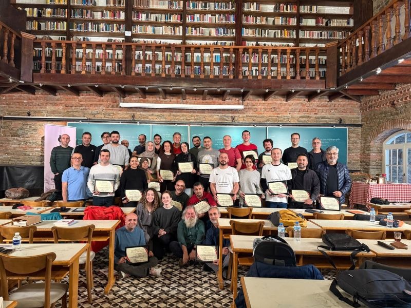 Mathematics teachers and program participants gathered in a library classroom at the Nesin Mathematics Village