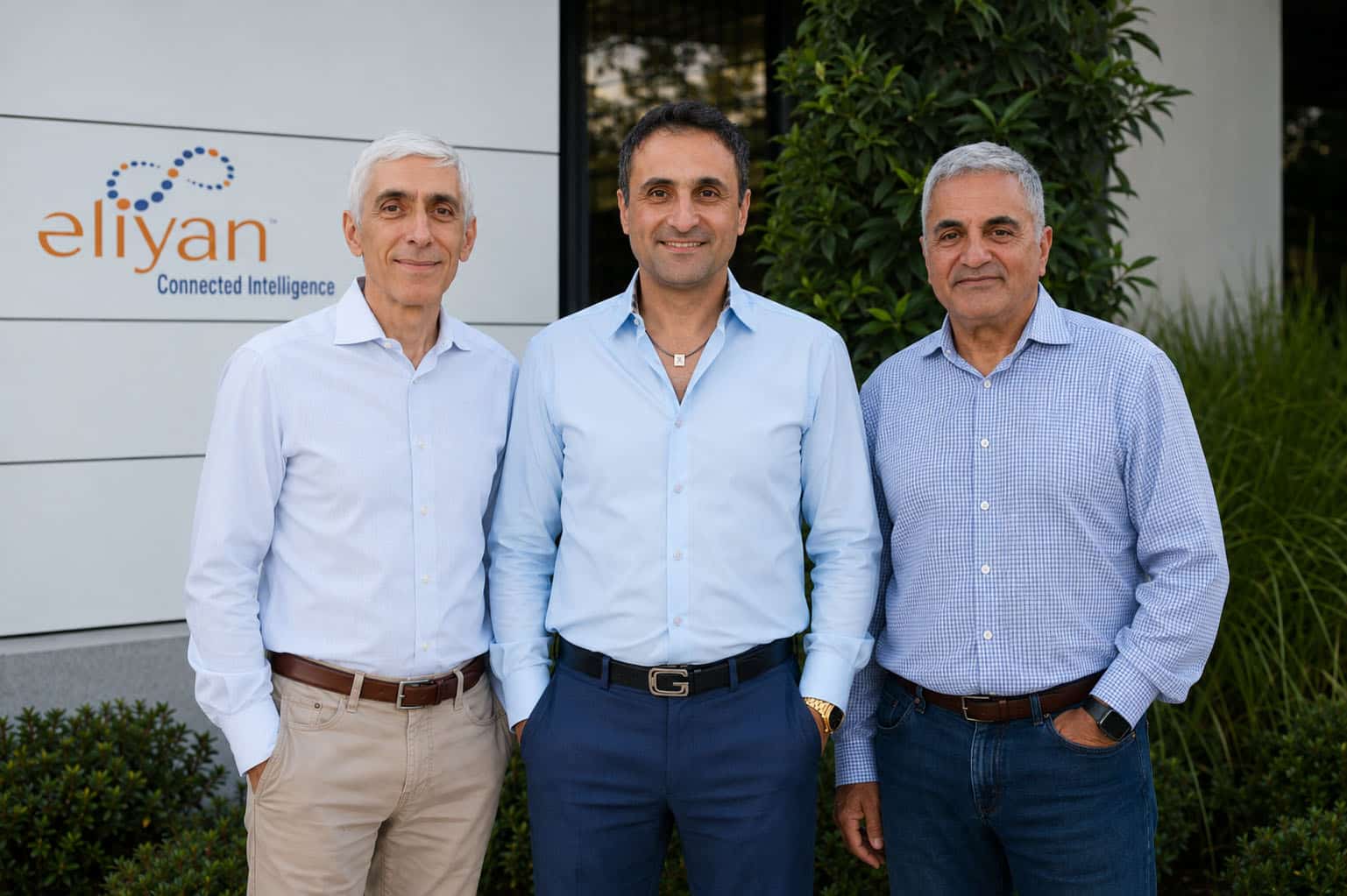 Eliyan founders Syrus Ziai, Ramin Farjadrad and Patrick Soheili standing together outside the company office