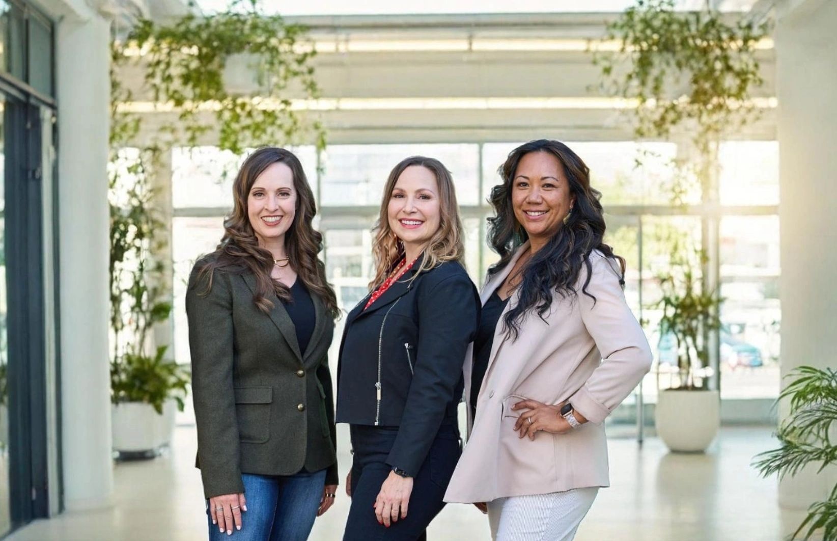 Spring Catalyst leadership team: Amber Winans, Elizabeth Zaborowska and Pam Njissang standing together