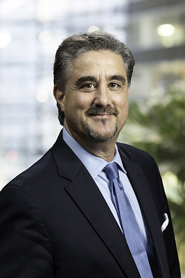 Elm Street founder Prem Luthra in a suit and tie
