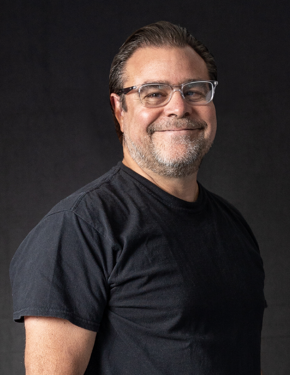 Emida Technologies co-founder David Brillembourg against a dark studio background
