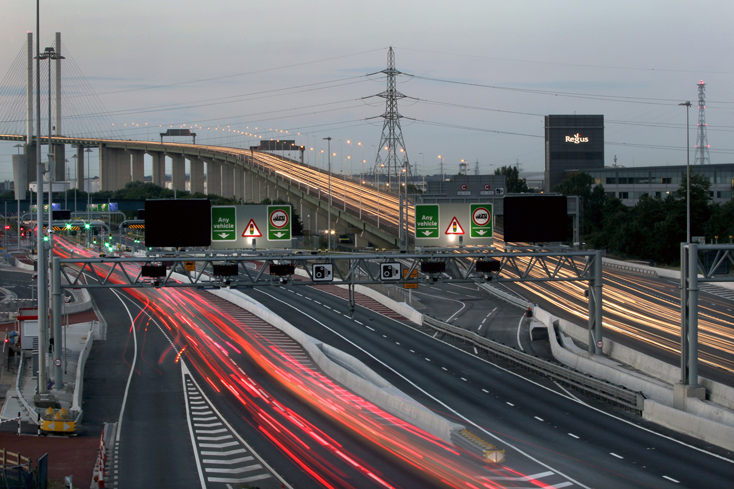 An elevated view of a road interchange and surrounding infrastructure
