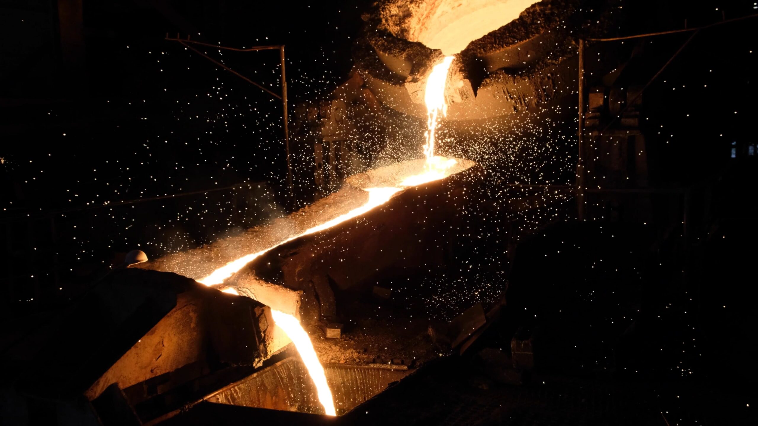 Molten gold being poured at a mine processing facility