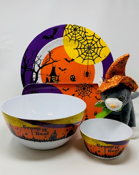 Matching Halloween bowls, plates and a black cat plush from Encore Associates’ seasonal product gallery
