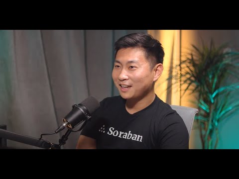 Enoch Ko speaking into a microphone during the PHX Founders interview