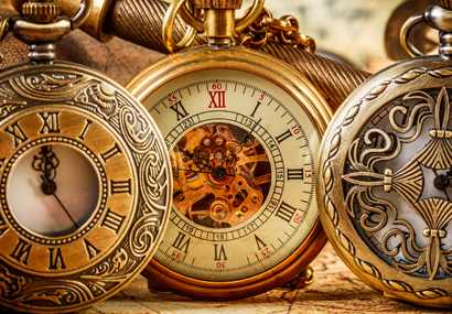 Ornate antique pocket watches used to illustrate Enservio specialty valuation