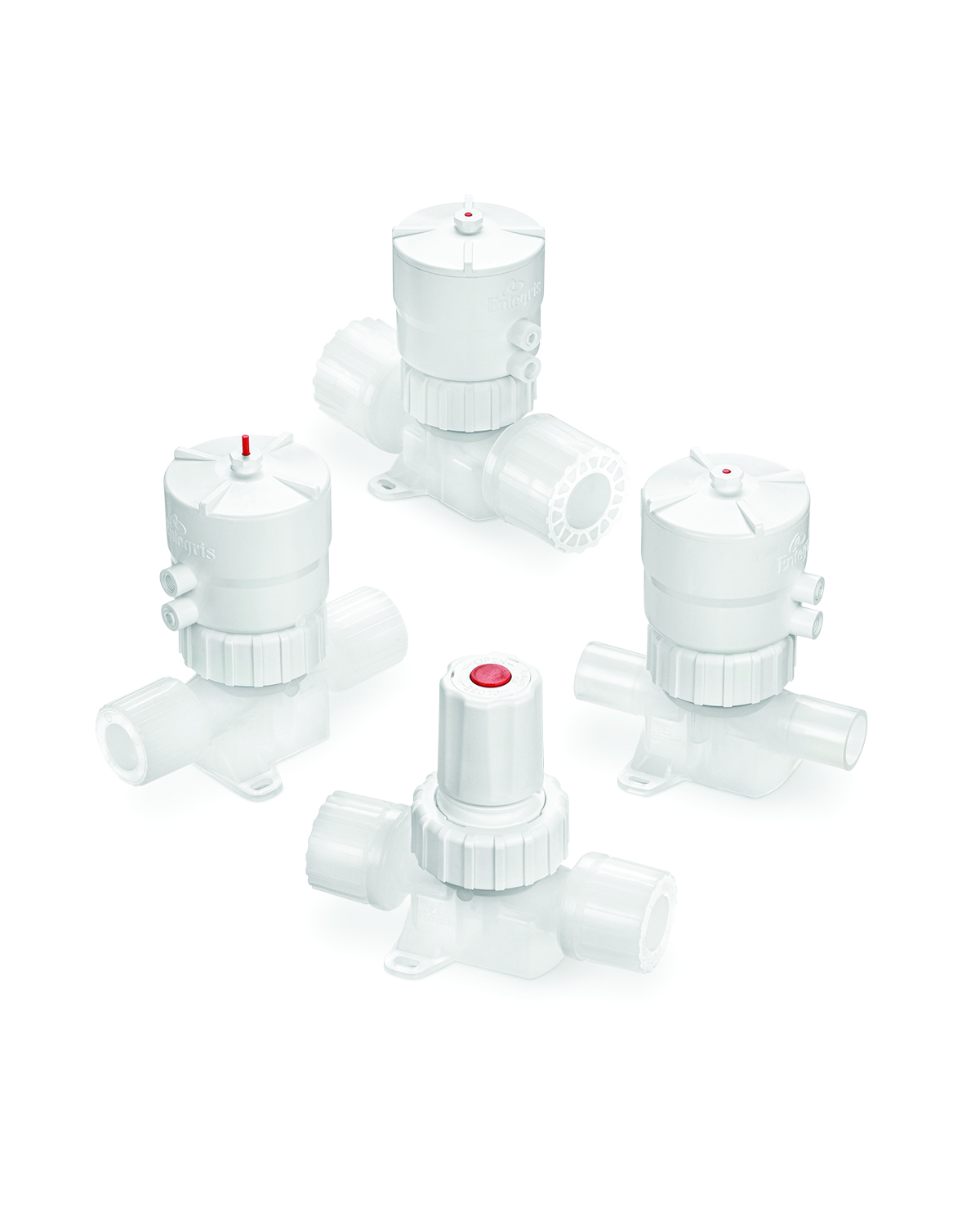 Four Integra weir valves with white polymer bodies