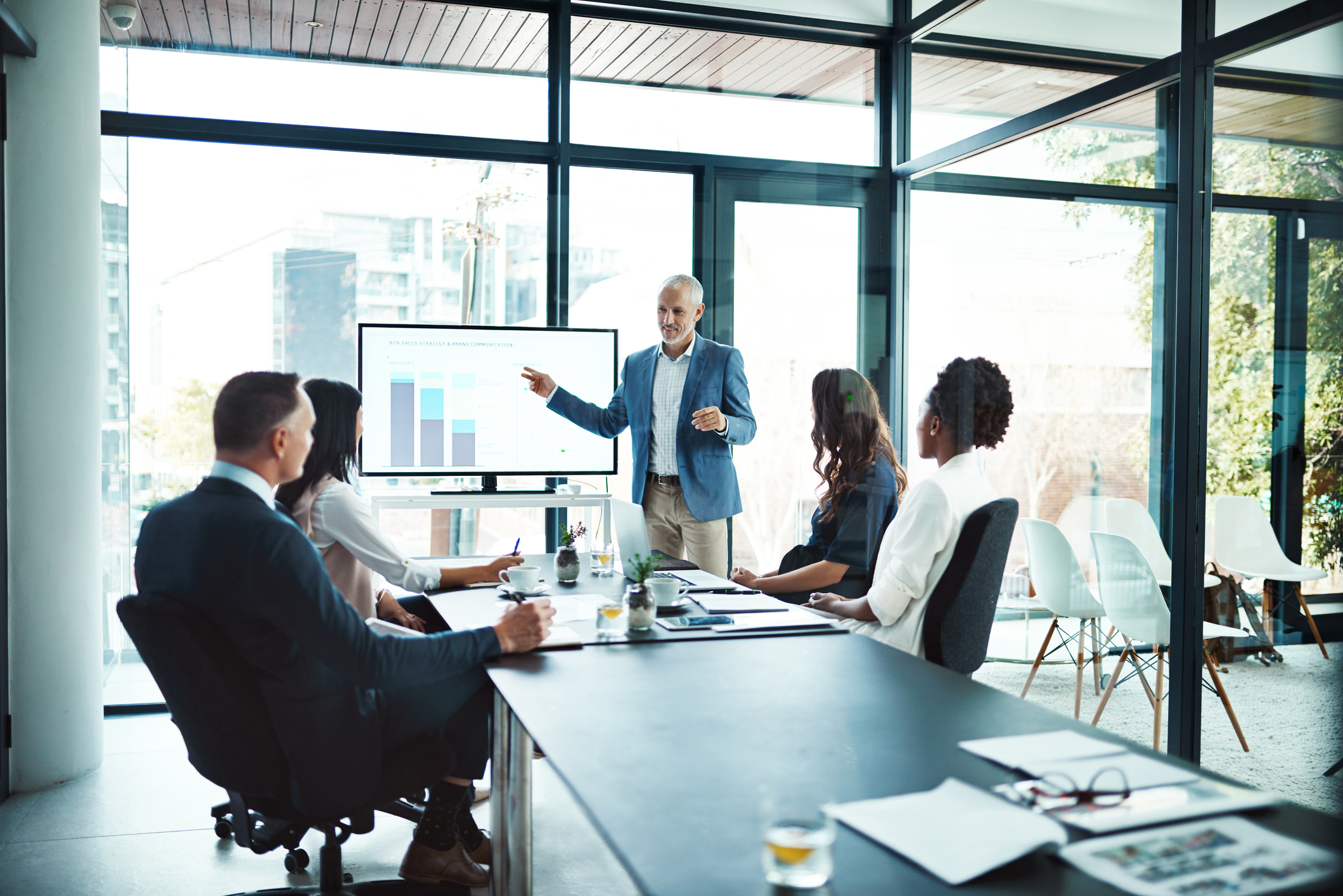 A business presentation in a bright conference room