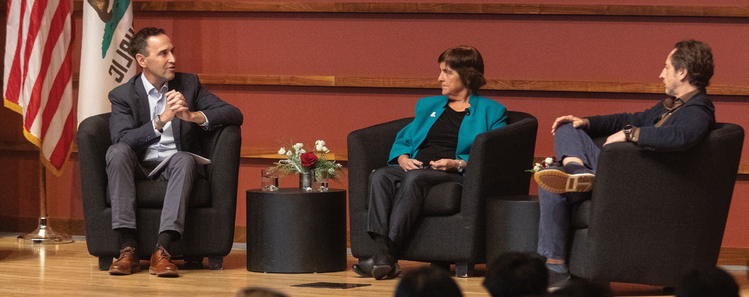 Jonathan Levin, Jennifer Widom, and Sergey Brin seated onstage at Stanford’s Engineering Centennial ETL event