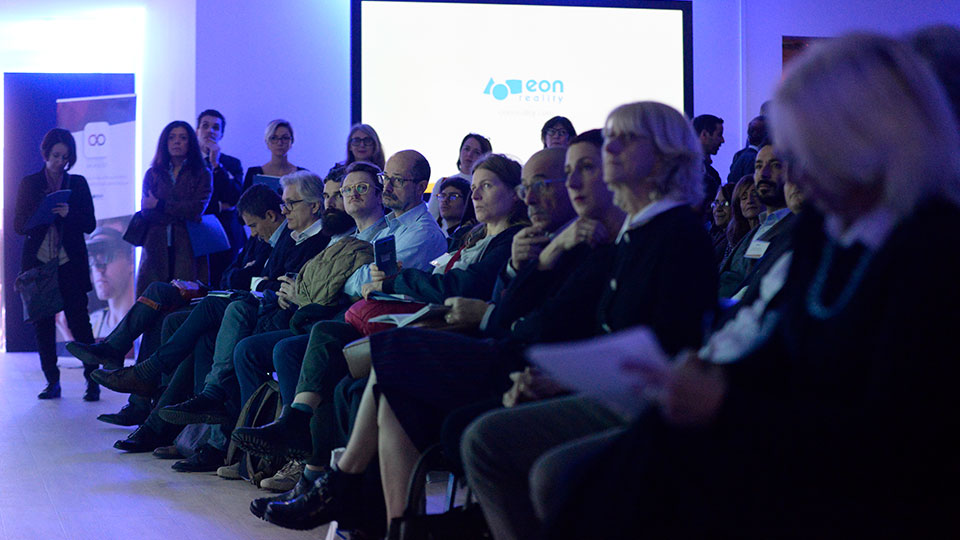 Seated audience at EON Reality’s Italian centre inauguration in 2018
