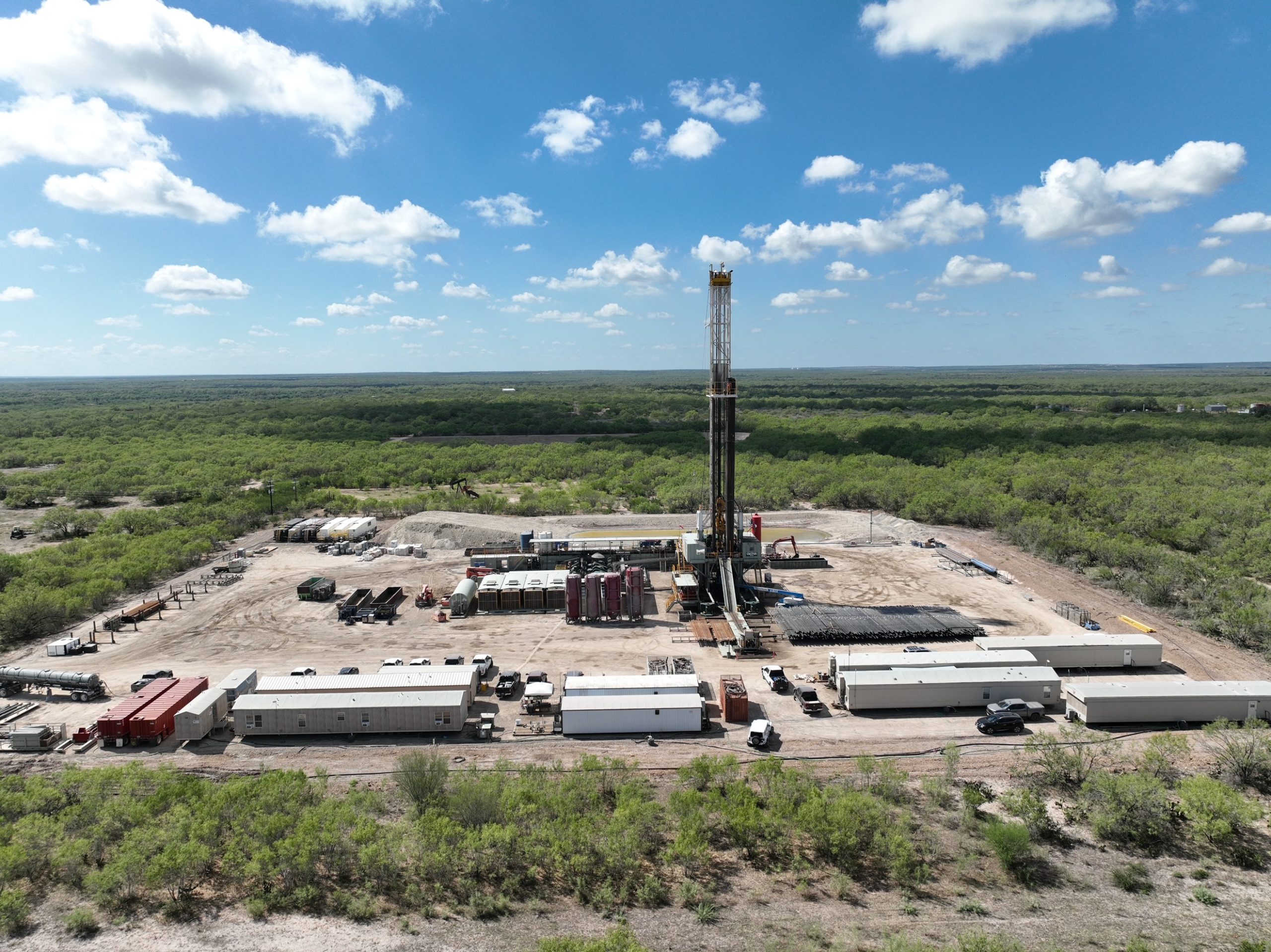 Aerial view of an active South Texas oil and gas well pad