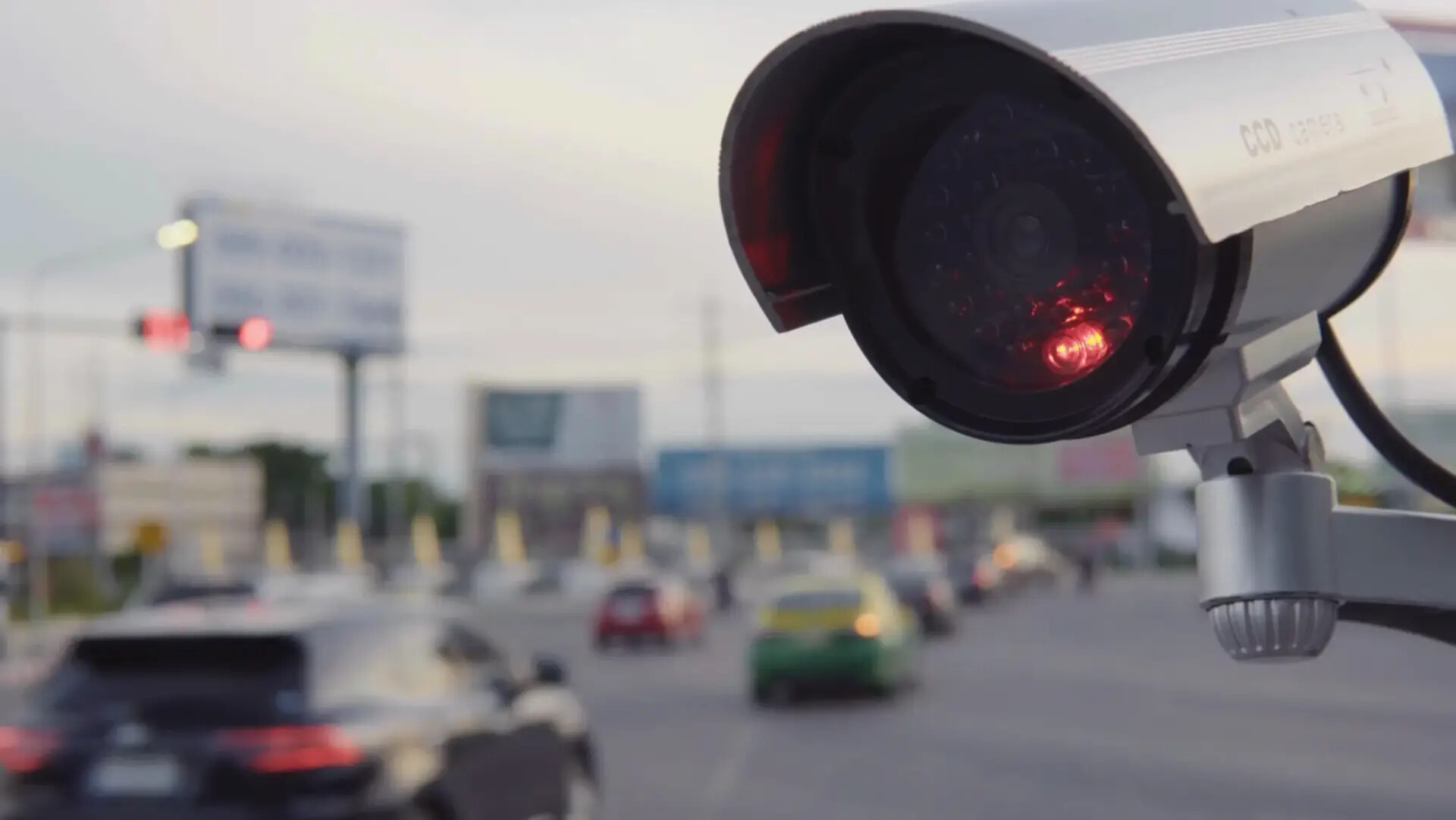 A surveillance camera overlooking a busy roadway