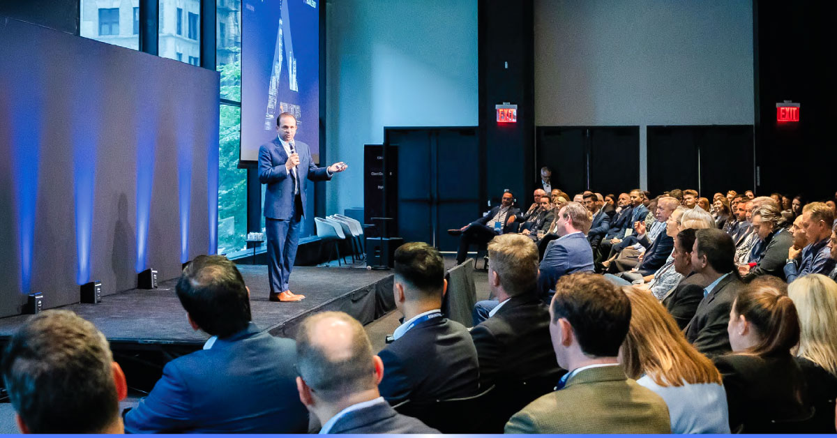 Rich Grossi addressing an audience at an Equilend client event