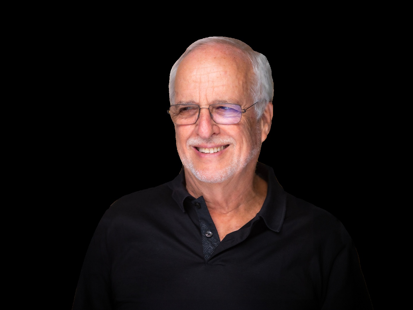 Eran Baniel smiling in a photograph accompanying his GreyB interview