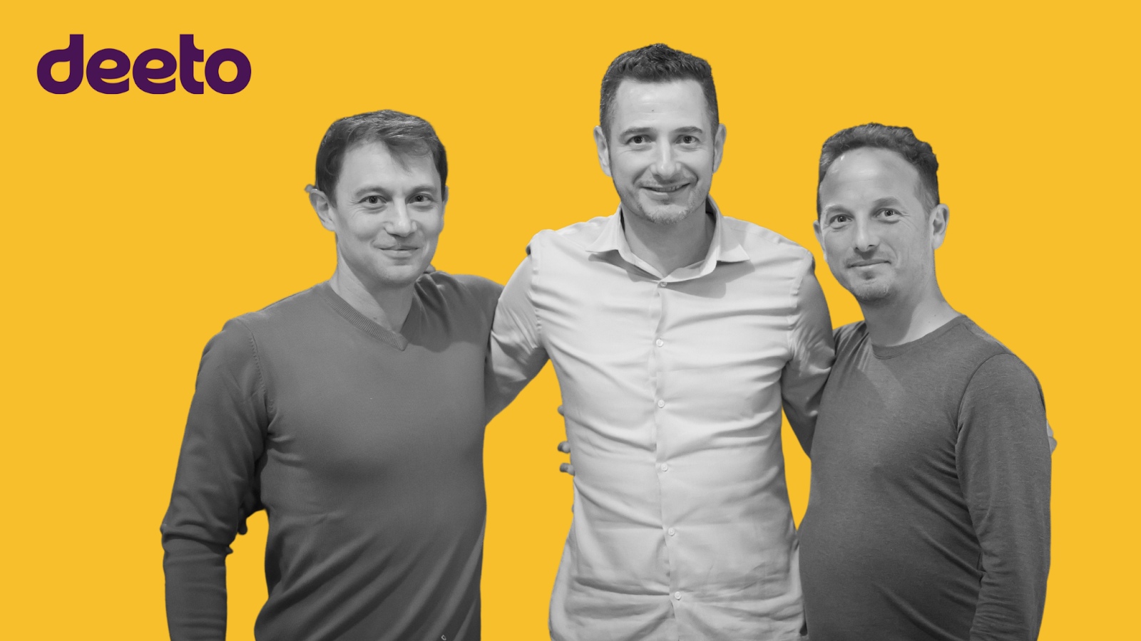 Deeto co-founders Yossi Gelman, Eran Baron and Golan Raz standing together against a yellow background