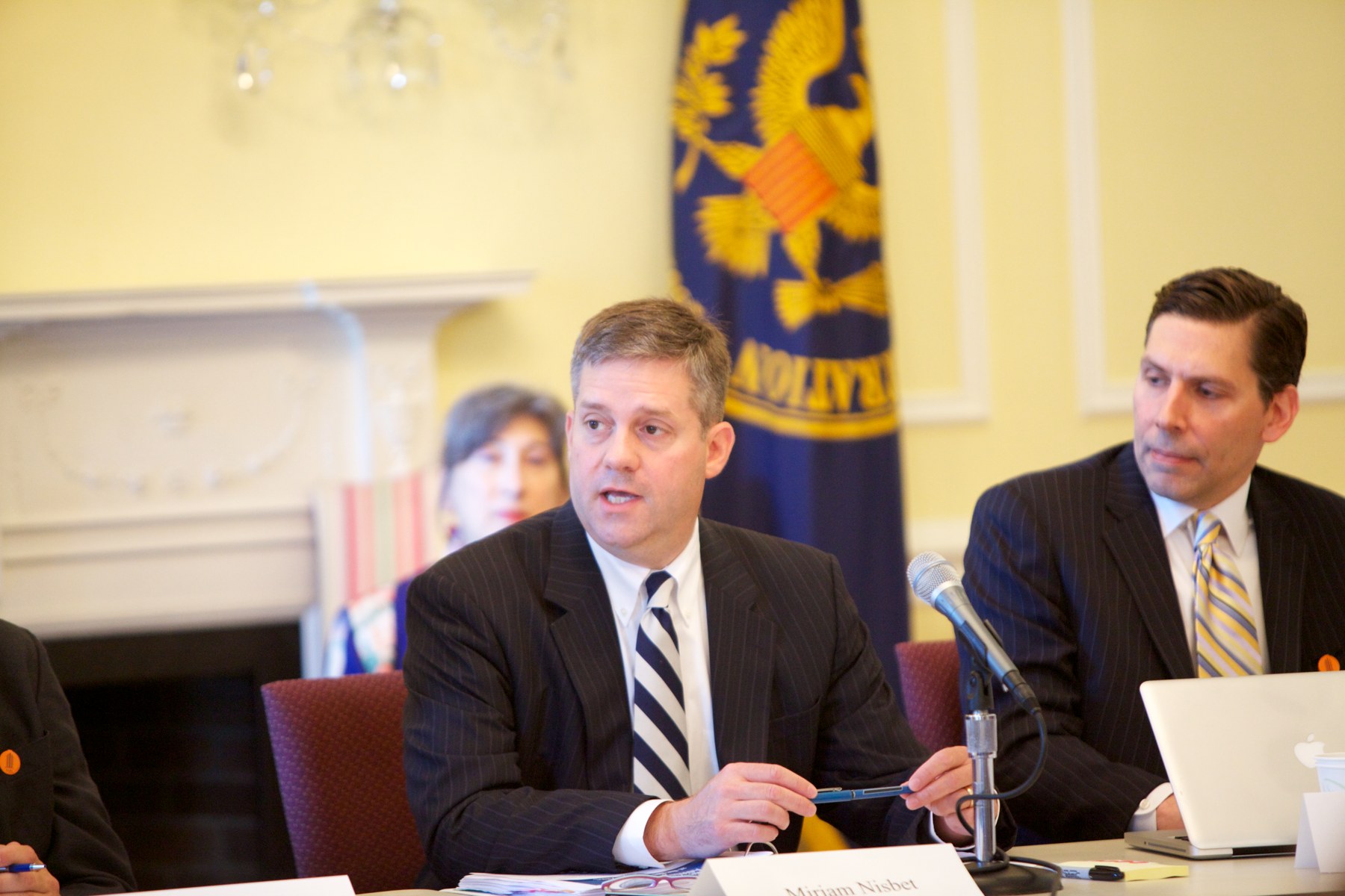 Eric Gillespie seated at a microphone during a 2014 Freedom of Information Act Advisory Committee meeting
