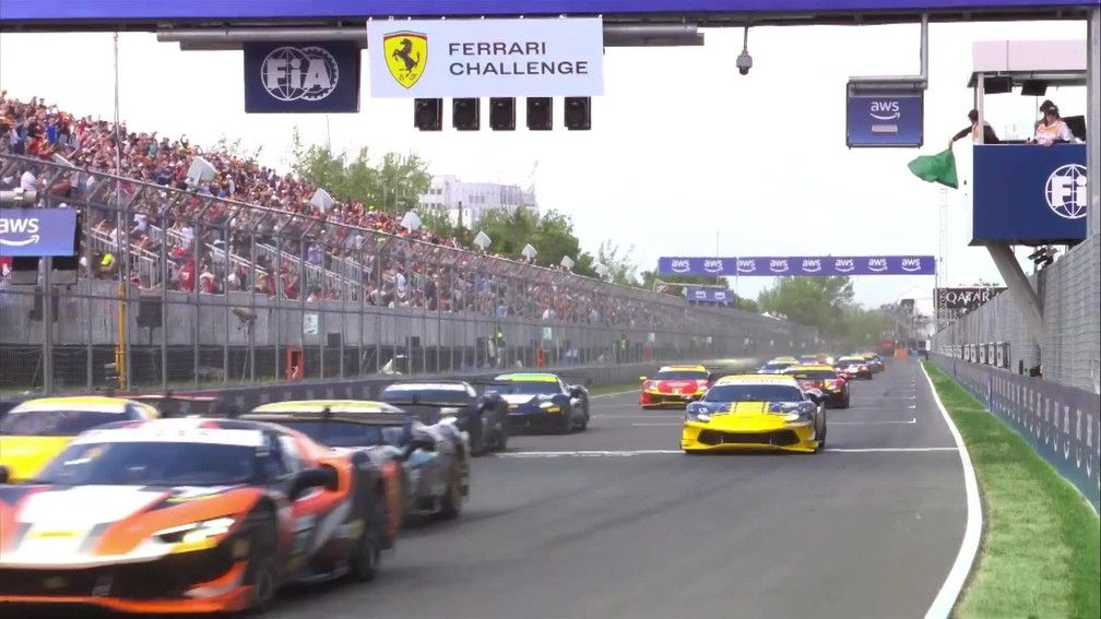 Ferrari Challenge cars accelerate away from the starting line in Montréal