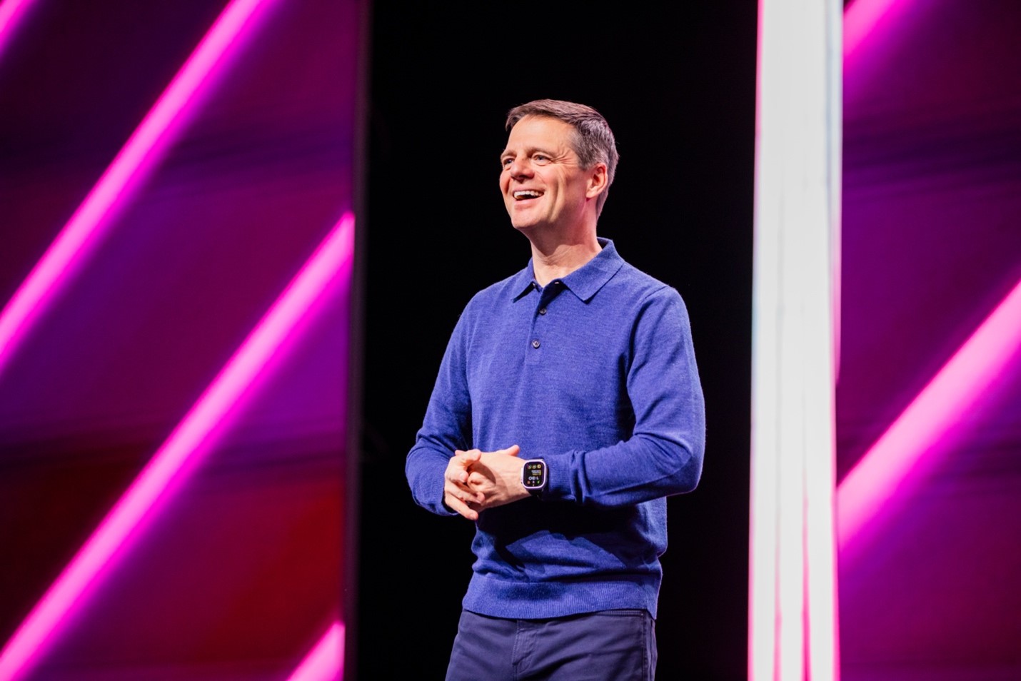 Eric Mosley smiling on stage at Workhuman Live 2025 in Denver